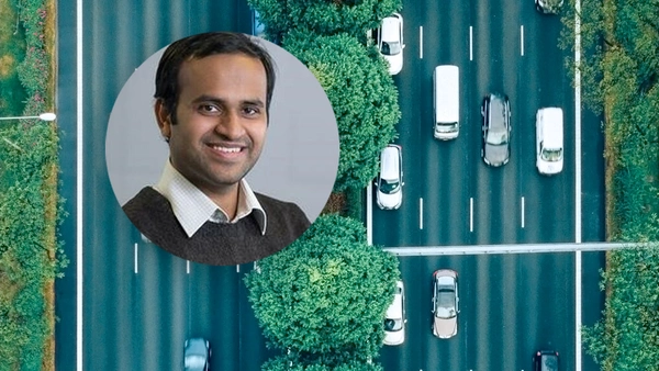 Abbildung von Amit Chaulwar mit einer mehrspurigen Straße im Hintergrund